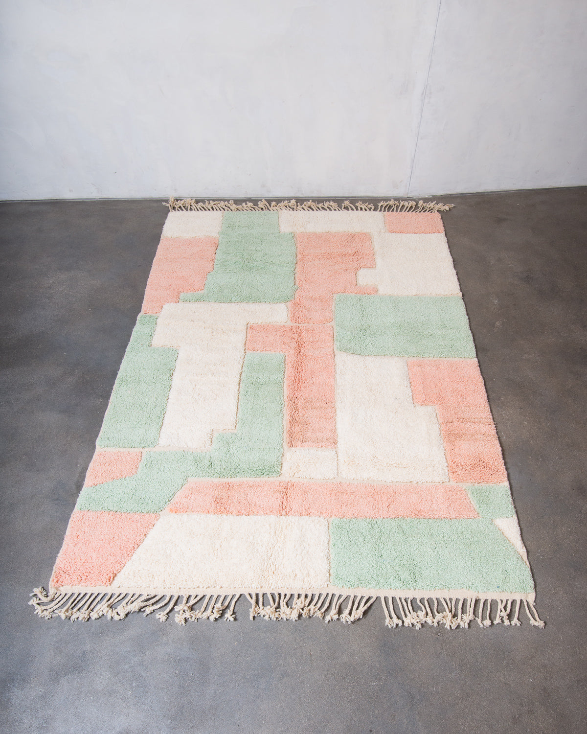 Modern, designer, handcrafted Berber rug from Morocco. Beniourain carpet with beautiful colours and patterns and fluffy wool texture.